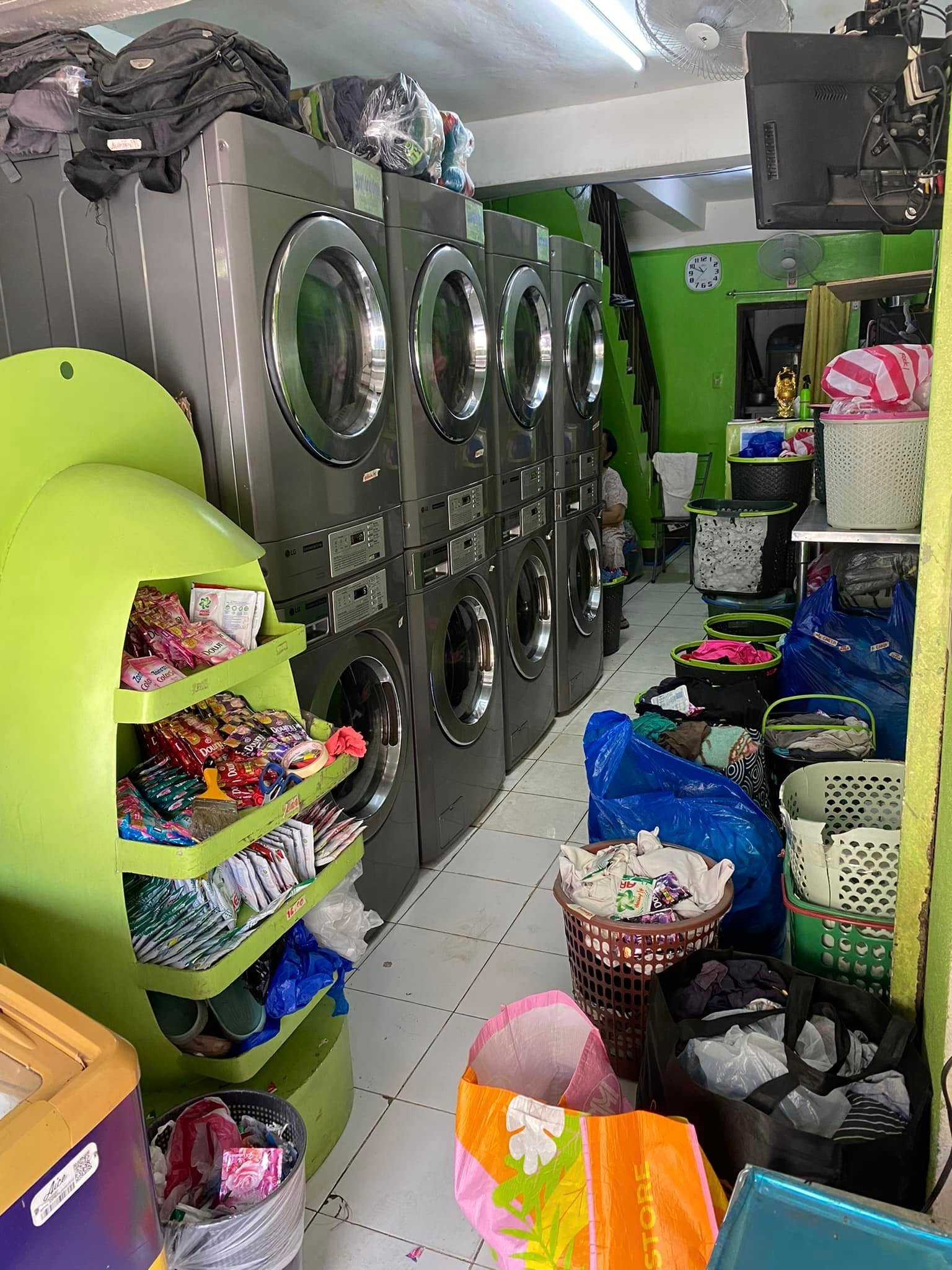 Staff folding laundry